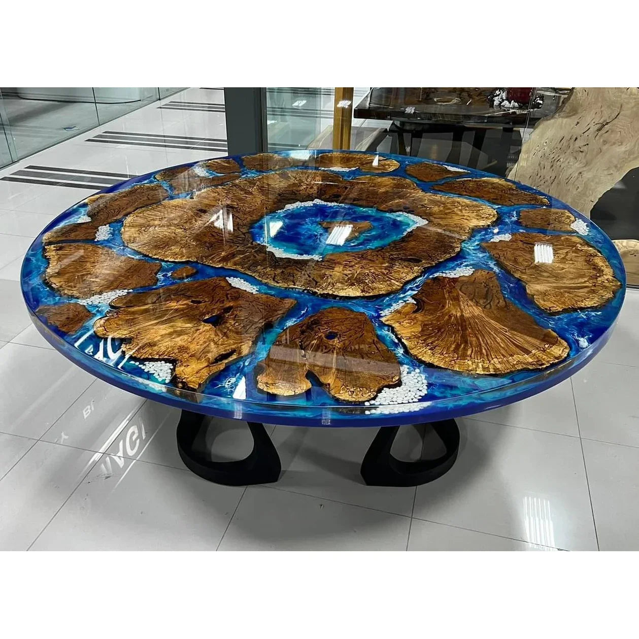 Round epoxy dining table with blue resin river handmade in Toronto