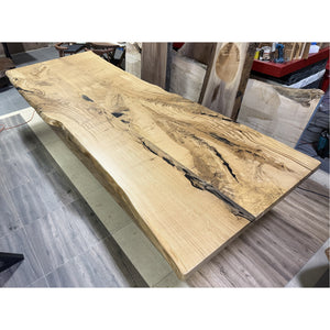 Full-length live edge Canadian white oak slab dining table with black epoxy veining — handmade in Toronto by CanadaTables