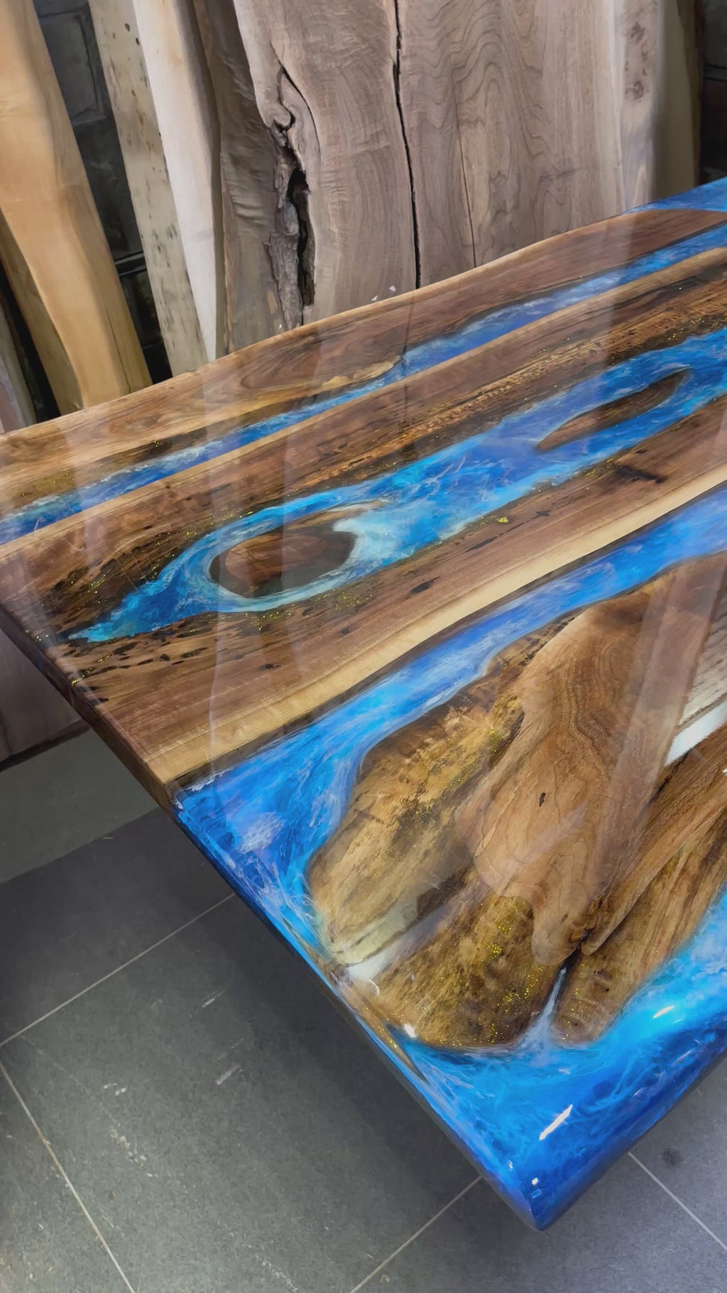 120”x48” solid Black Walnut tabletop with deep ocean multi-layer epoxy ...